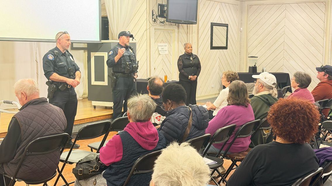 Community members gathered for a discussion with Aurora police officers.